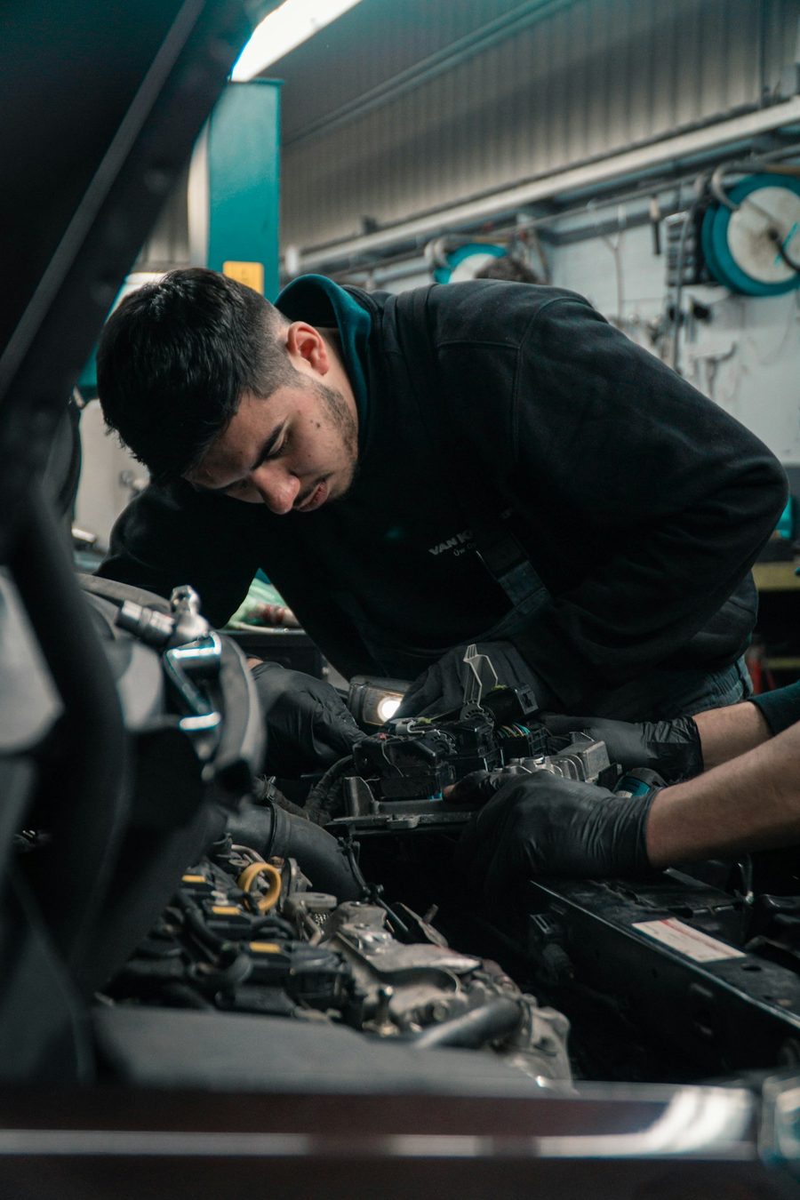 Technician working on an engine